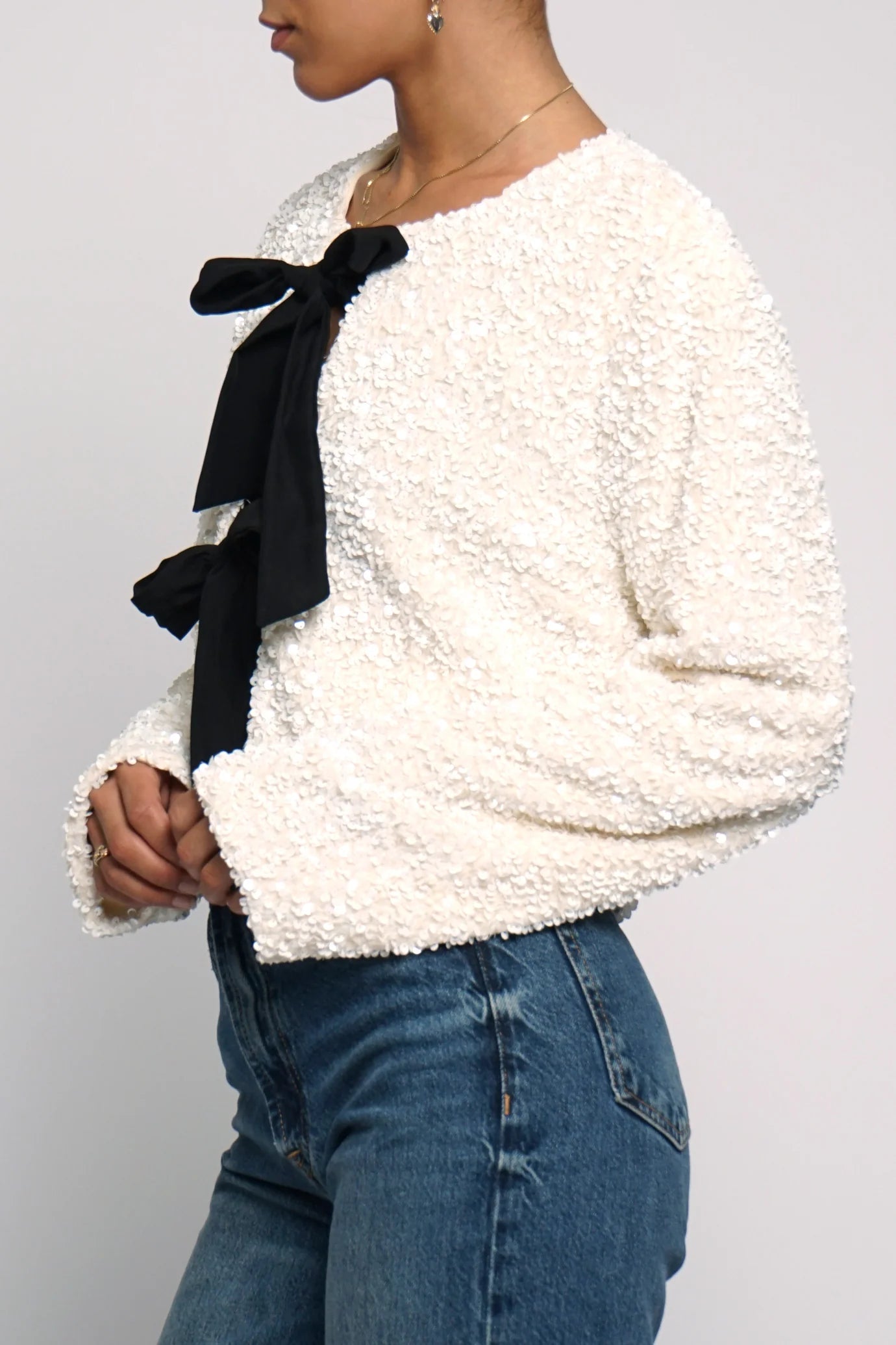 Saco lentejuelas con moño – eNe Boutique